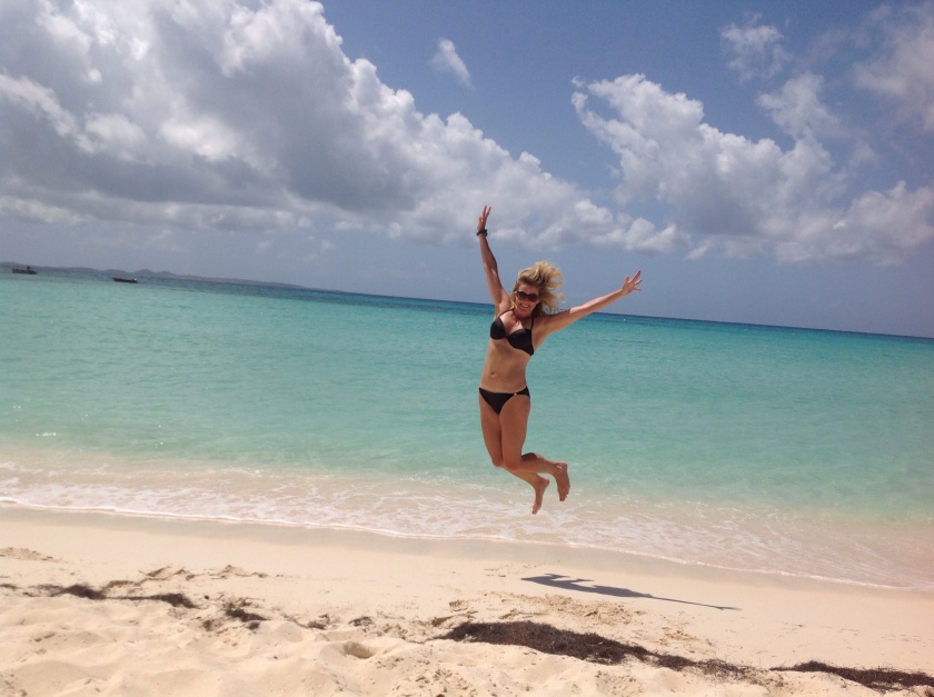 Jumping for joy on Cove Bay Beach.